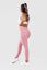 Full length side shot of girl wearing pink adapt scrunch bum leggings