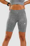 Close up front shot of girl wearing calyspo seamless shorts in grey