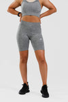 Close up front shot of girl wearing calyspo seamless shorts in grey