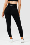 Girl wearing black intrigue scrunch bum leggings front