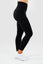 Side view of girl wearing black intrigue scrunch bum leggings