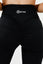 Close up black intrigue scrunch bum leggings back