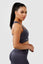 Girl wearing invictus seamless set in charcoal, side