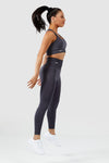 Girl wearing invictus seamless leggings charcoal