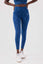 Girl wearing legacy scrunch bum leggings in blue front