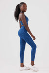 Girl wearing legacy scrunch bum leggings in blue front