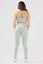 girl wearing mint legacy scrunch bum set back
