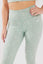close up girl wearing legacy scrunch bum leggings in mint