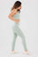 Side view girl wearing legacy scrunch bum set in mint