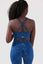 Girl wearing blue legacy scrunch bum set back