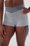 Close up girl wearing grey luna scrunch bum short hand on hip front