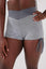 Close up girl wearing grey luna scrunch bum short hand on hip front