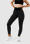 Girl wearing black luna scrunch bum leggings hands on hips