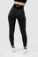 Girl wearing black luna scrunch bum leggings back