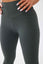 Close up girl wearing khaki luna x seamless scrunch bum leggings side