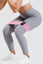 close up girl wearing grey adapt scrunch leggings with pink resistance band around thighs