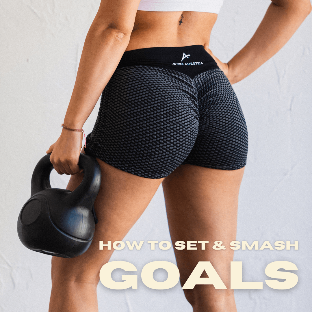 model in scrunch bum shorts holding dumbbell with text that reads 'how to set and smash goals'