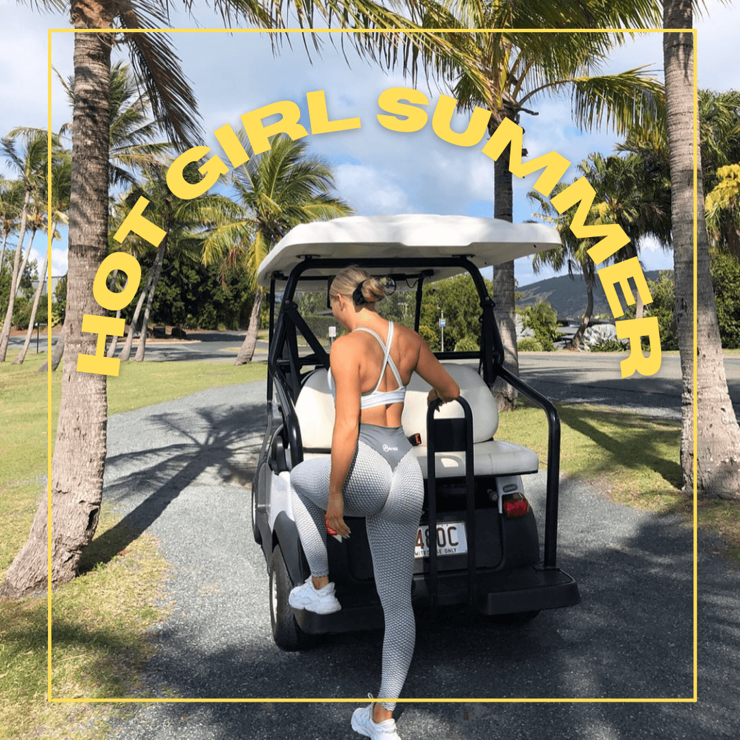 fitness model in workout top and leggings with text that reads 'hot girl summer'