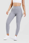 Girl wearing grey adapt scrunch bum leggings