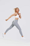 Girl wearing grey adapt scrunch bum leggings