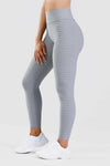 Girl wearing grey adapt scrunch bum leggings