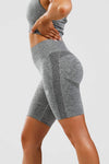 Close up front shot of girl wearing calyspo seamless shorts in grey 