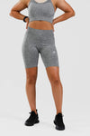 Close up front shot of girl wearing calyspo seamless shorts in grey 