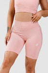 Close up girl wearing claypso seamless short in pink marl