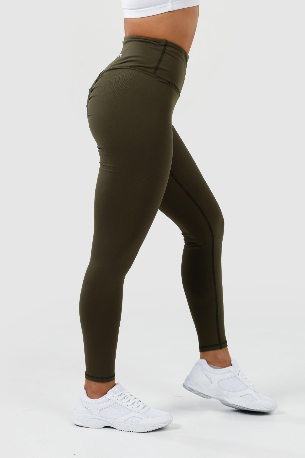 Side view girl wearing olive intrigue scrunch bum leggings 