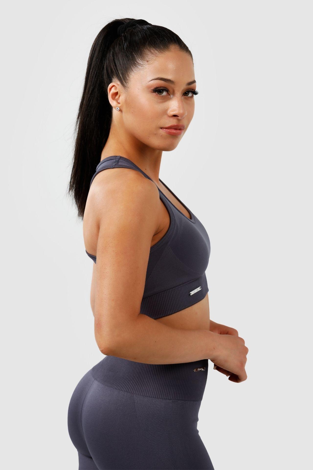 Girl wearing invictus seamless set in charcoal, side