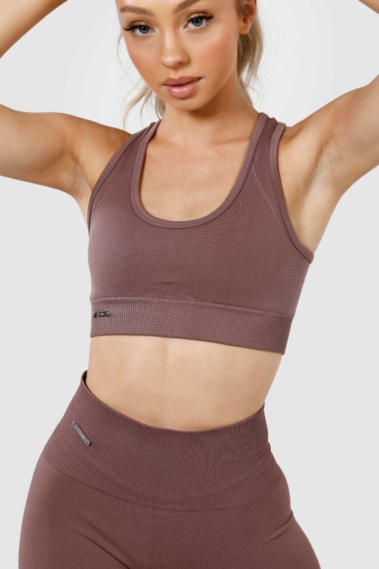 Close up girl posing wearing invictus seamless crop mauve purple