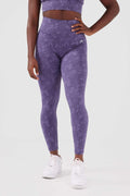 girl standing one hand on hip wearing legacy scrunch bum leggings in purple