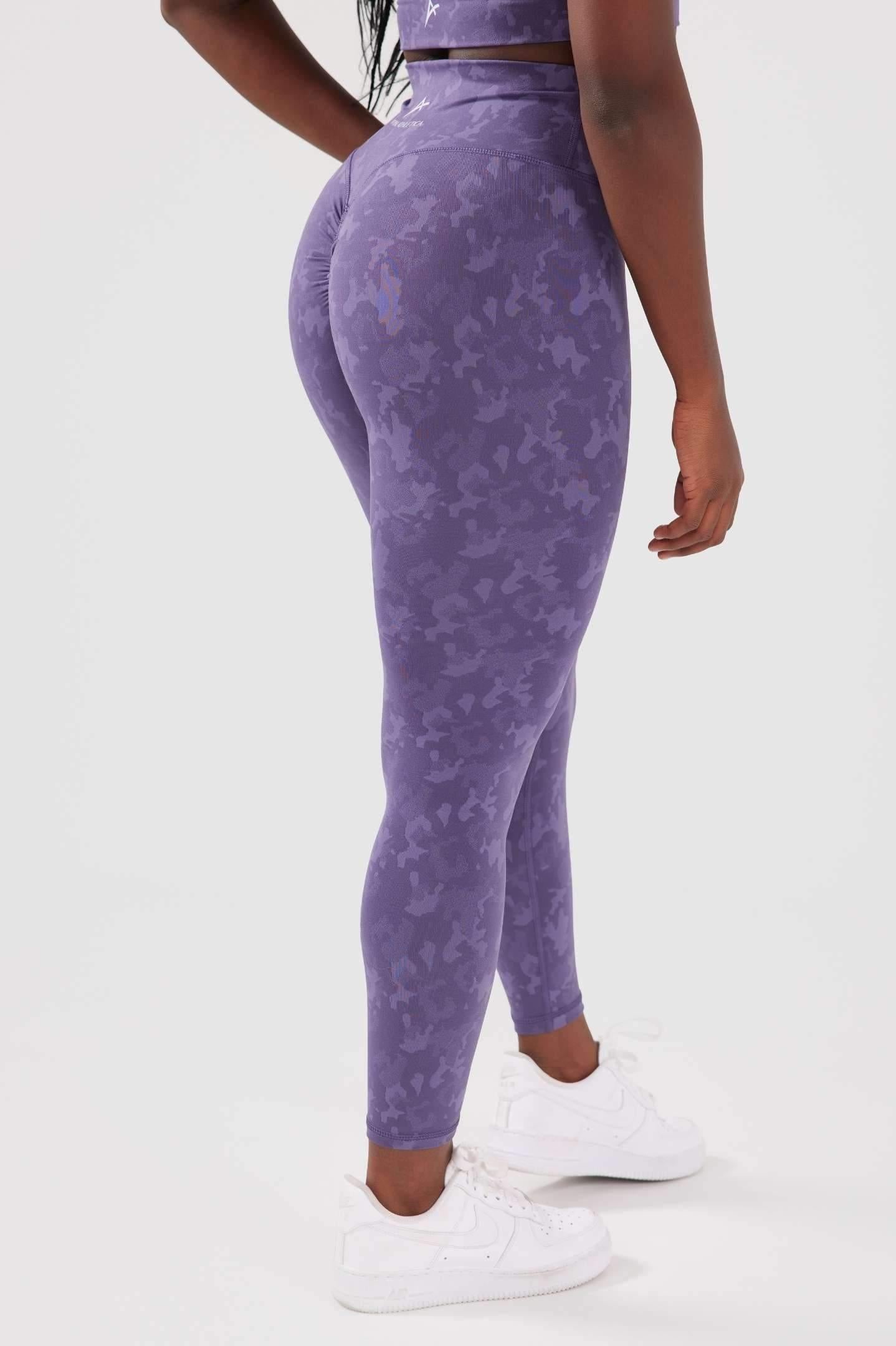 Girl wearing purple scrunch bum leggings back