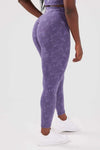 girl standing one hand on hip wearing legacy scrunch bum leggings in purple