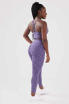 girl standing one hand on hip wearing legacy scrunch bum leggings in purple