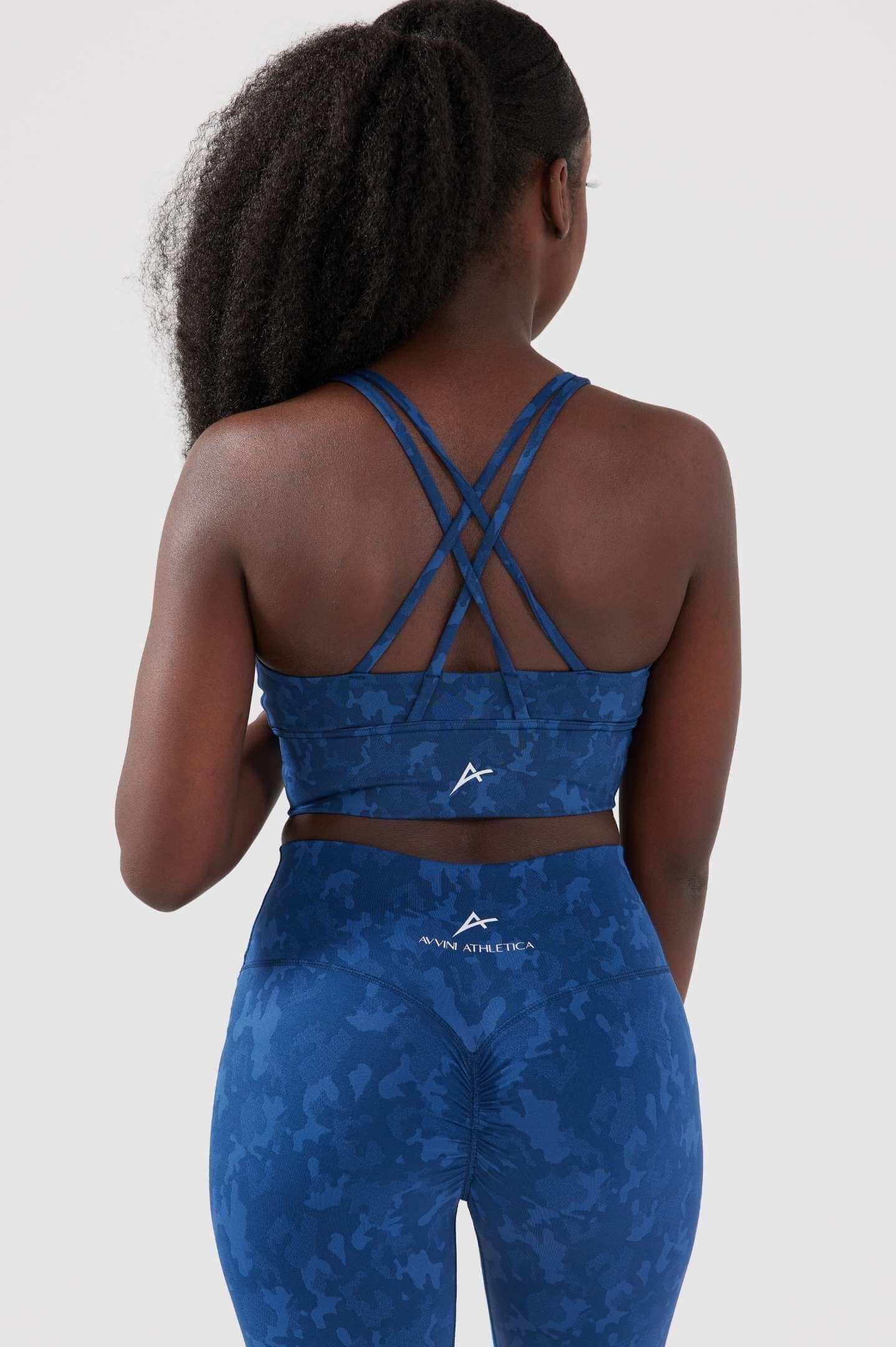 Girl wearing blue legacy scrunch bum set back
