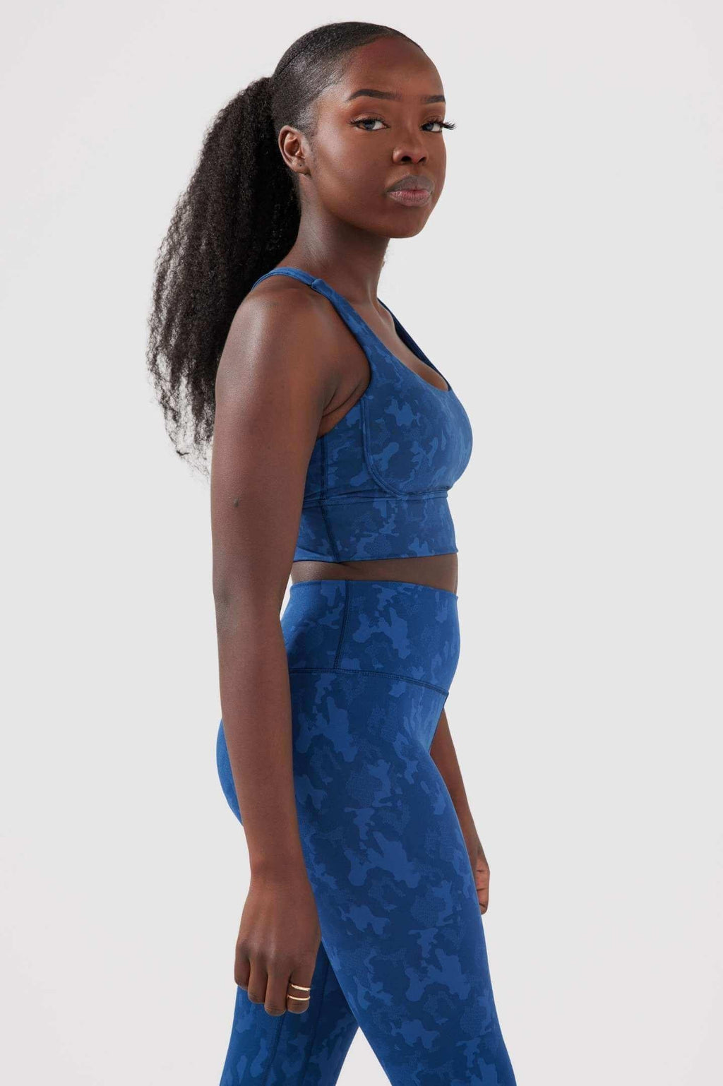 Girl wearing legacy scrunch bum set in blue