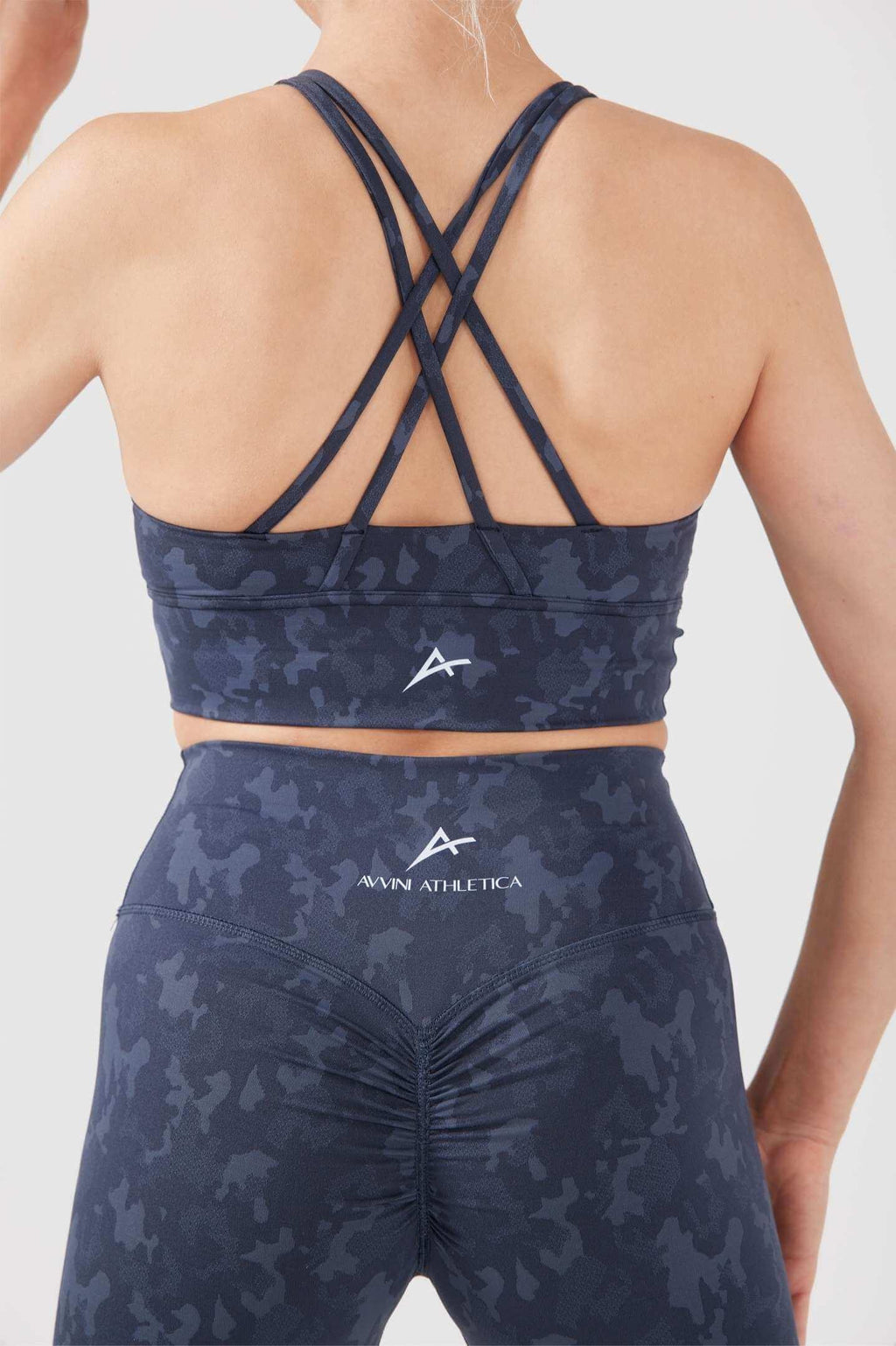 Girl wearing charcoal legacy scrunch bum set back