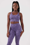 girl wearing legacy scrunch bum set in purple