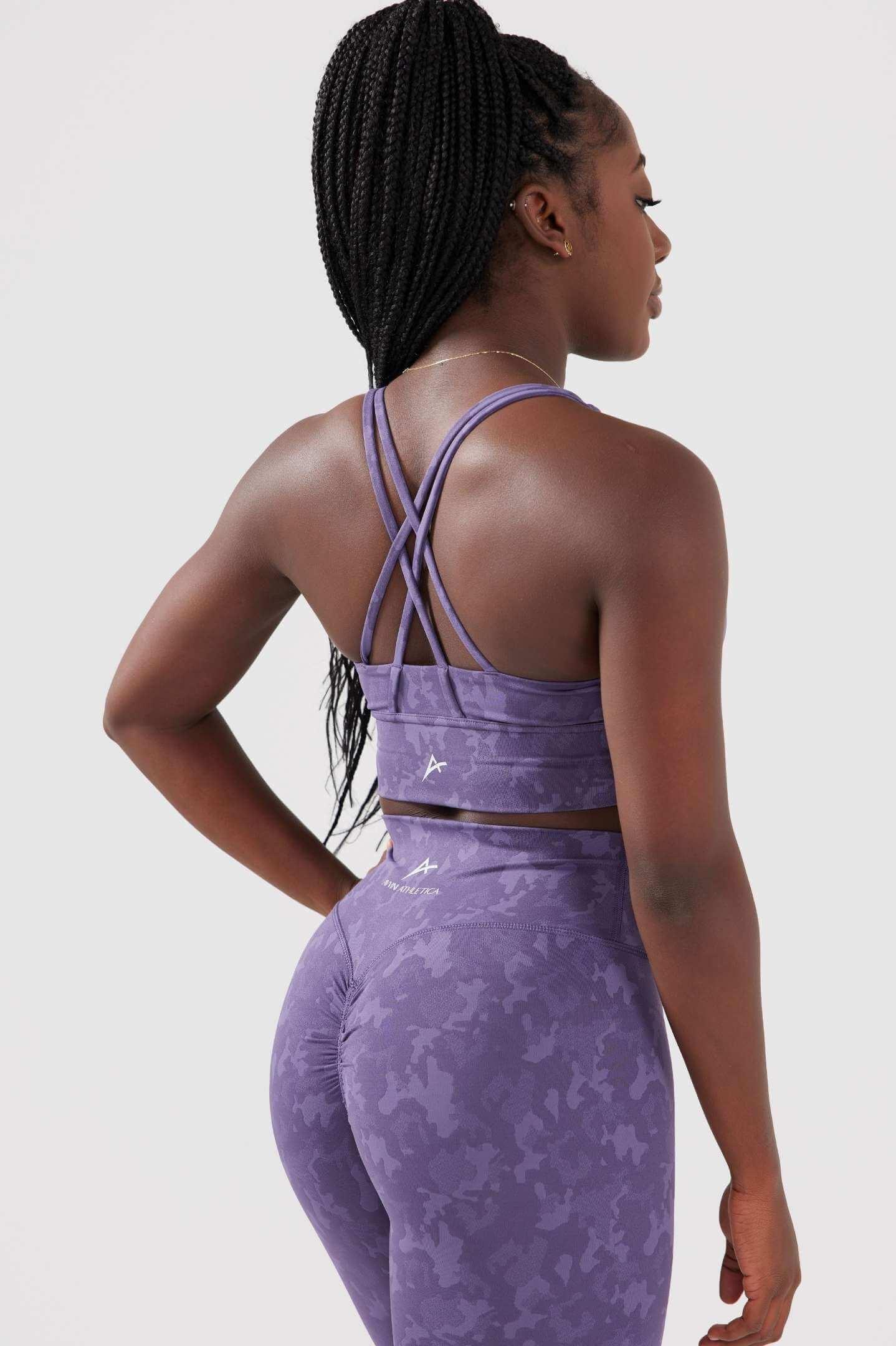 Girl wearing legacy scrunch bum purple set back 