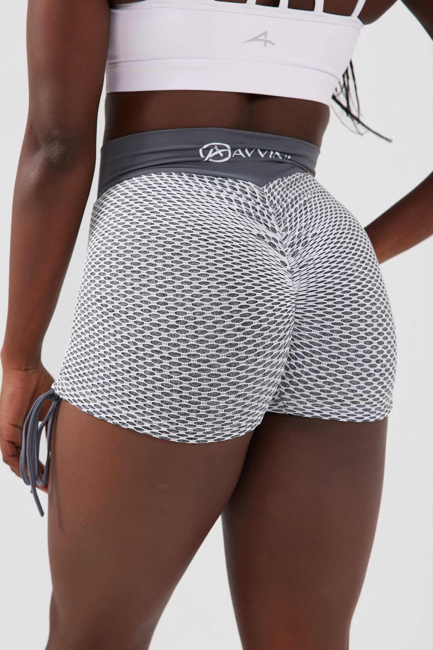 Close up girl wearing grey luna scrunch bum shorts back 