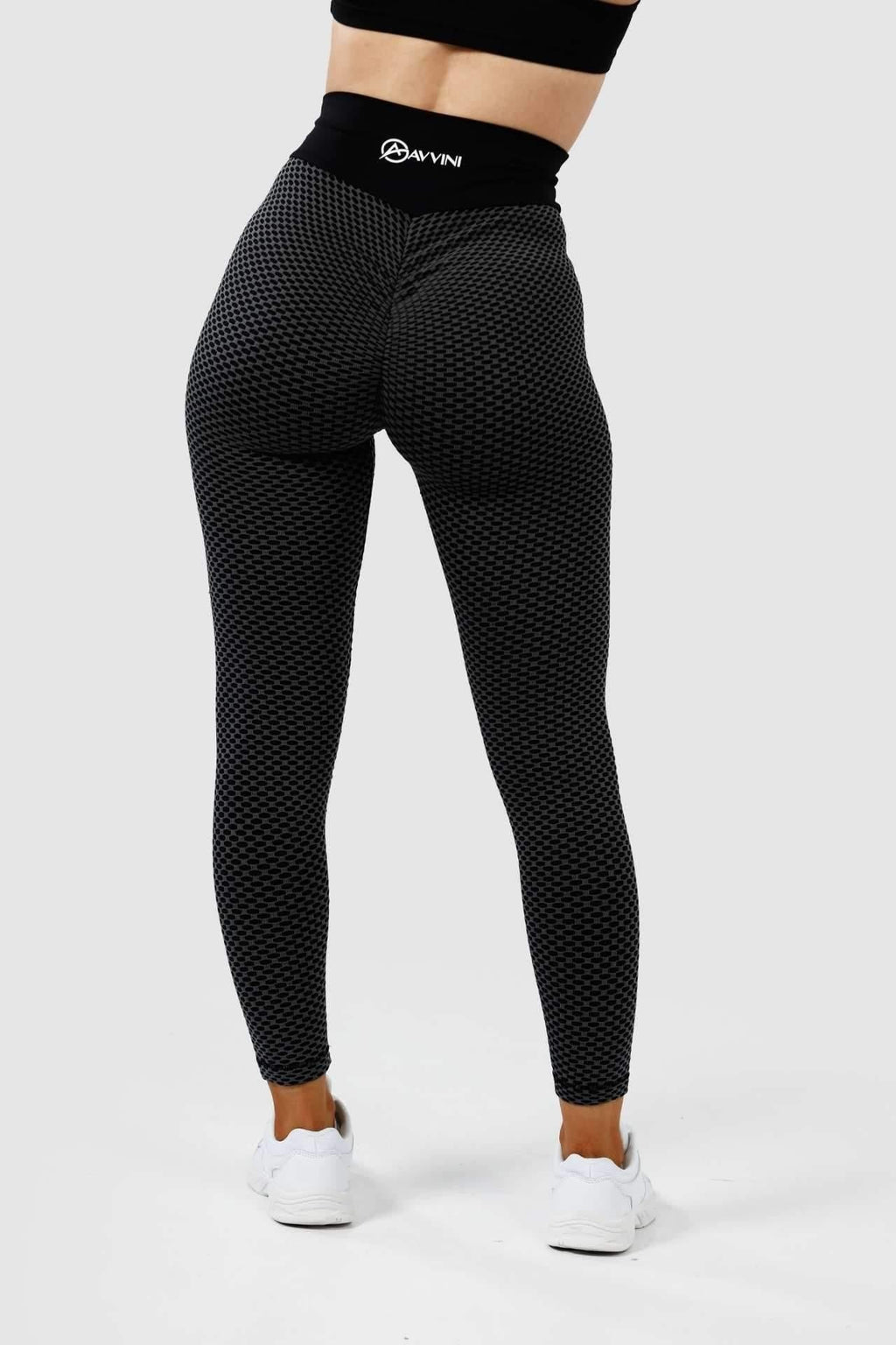 Girl wearing black luna scrunch bum leggings back