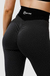 Girl wearing black luna scrunch bum leggings hands on hips 