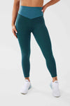 girl waring teal luna scrunch bum leggings