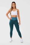 girl waring teal luna scrunch bum leggings