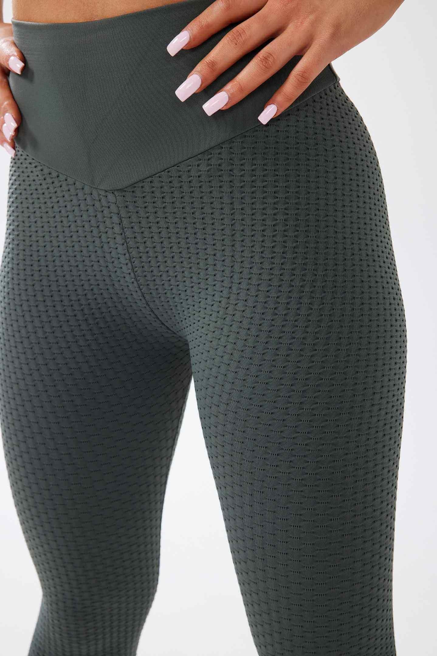 Close up girl wearing khaki luna x seamless scrunch bum leggings side
