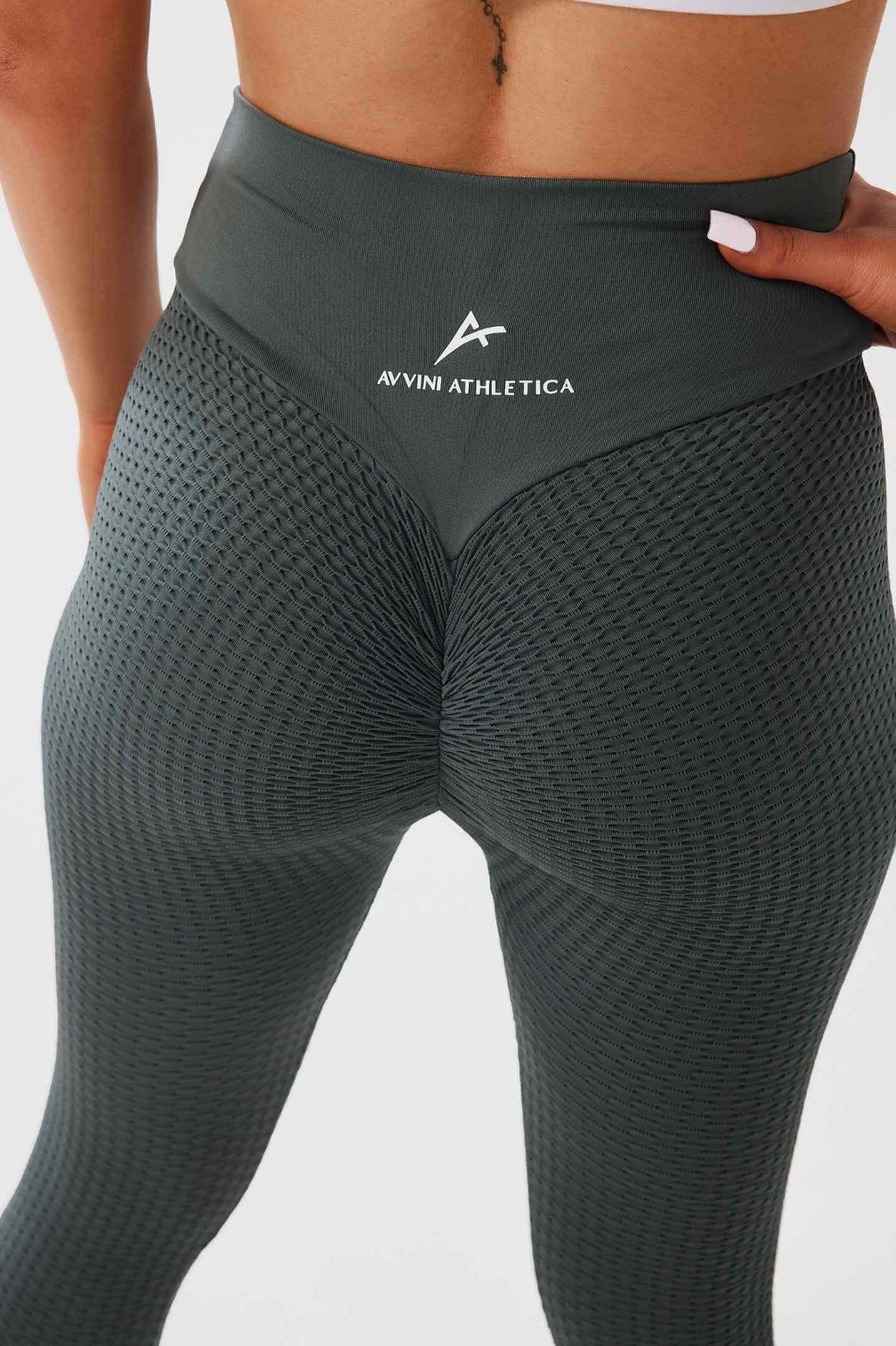 Close up girl wearing khaki luna x seamless scrunch bum leggings back