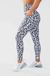 Close up girl hands in pockets wearing leopard luxe scrunch bum pocket leggings side