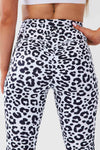 Close up girl hands in pockets wearing leopard luxe scrunch bum pocket leggings side