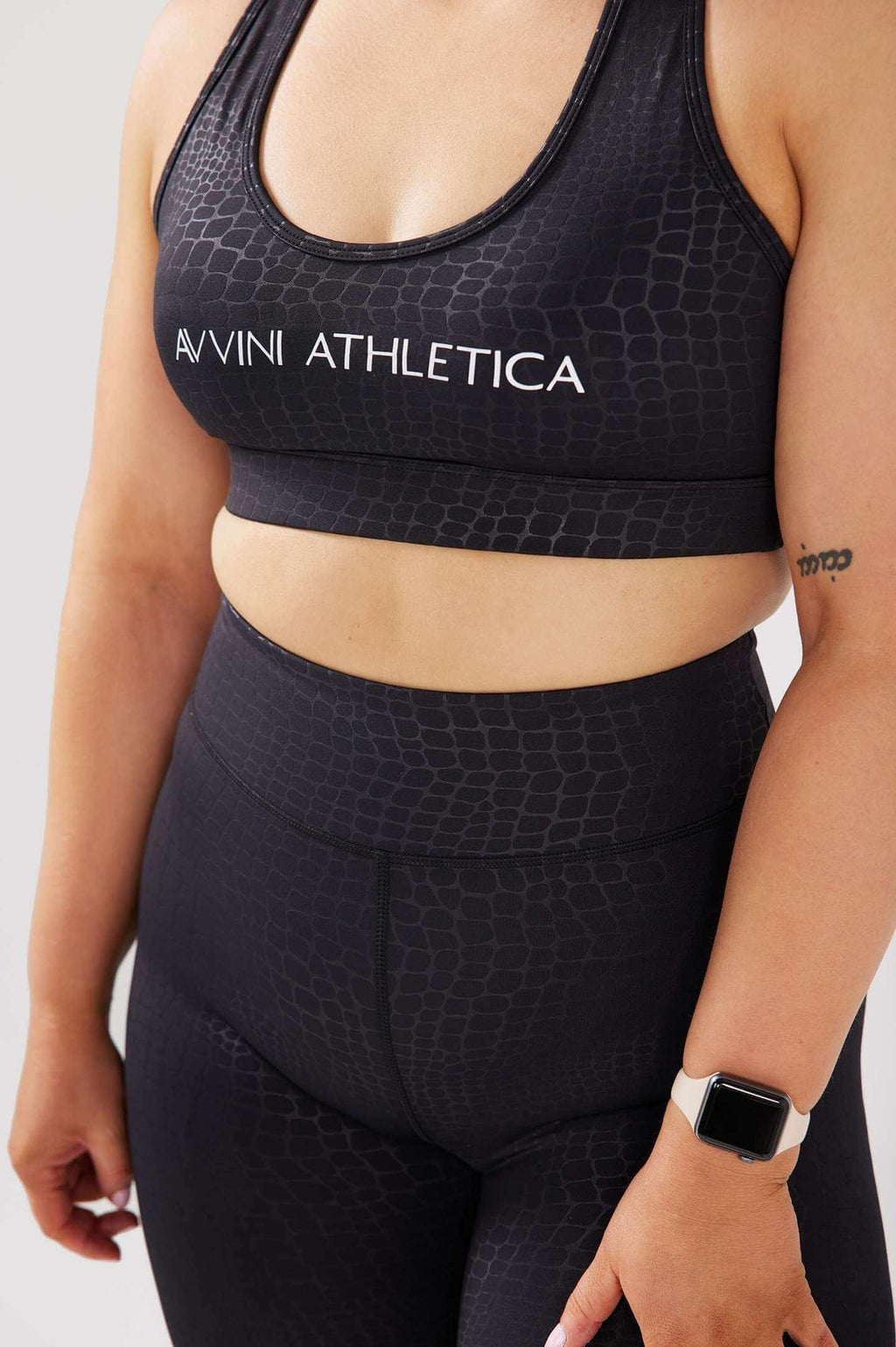 close up girl wearing luxe snake print set 